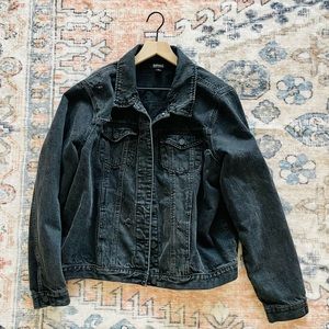 Black denim jacket with minor distressing. Perfect condition